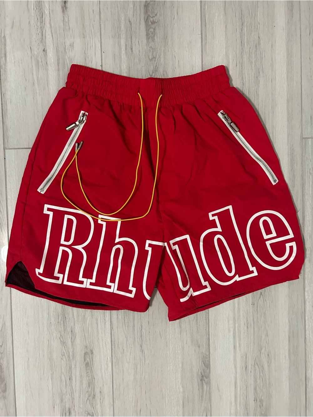 Red Athletic Shorts with Yellow Drawstring